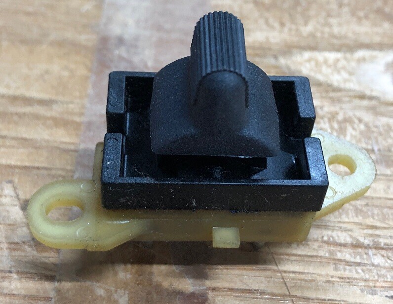 New Genuine Mopar Front Door-Lock Switch Part #4565330.