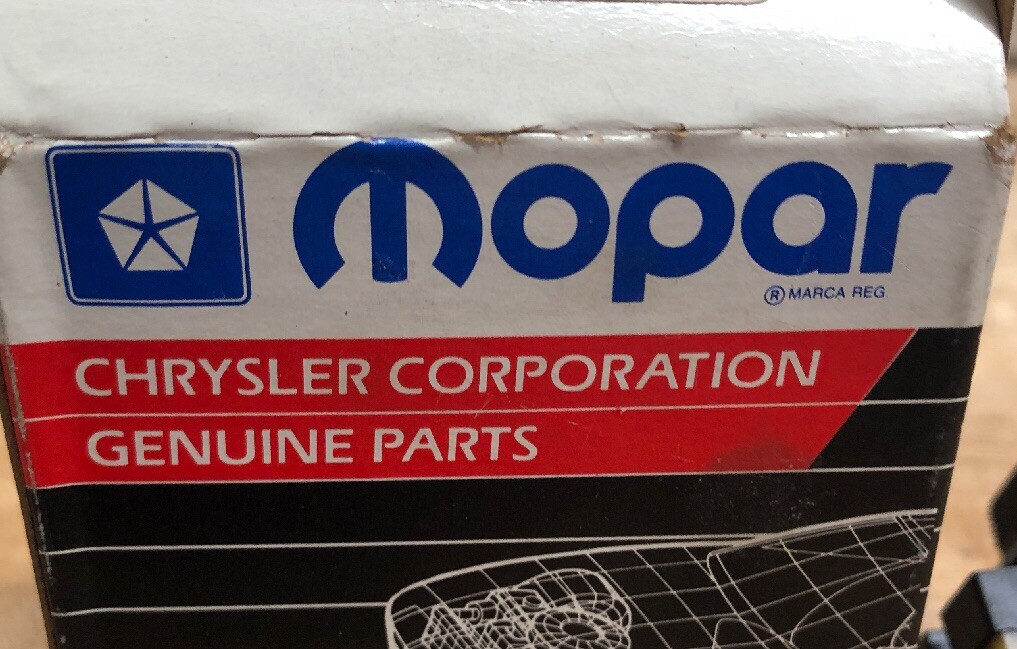 New Genuine Mopar Front Door-Lock Switch Part #4565330.