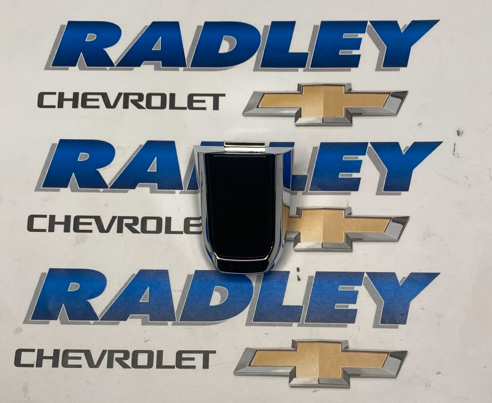NEW GM OEM FRONT DOOR- HANDLE ESCUTCHEON GMC- GENERAL MOTORS 13511028