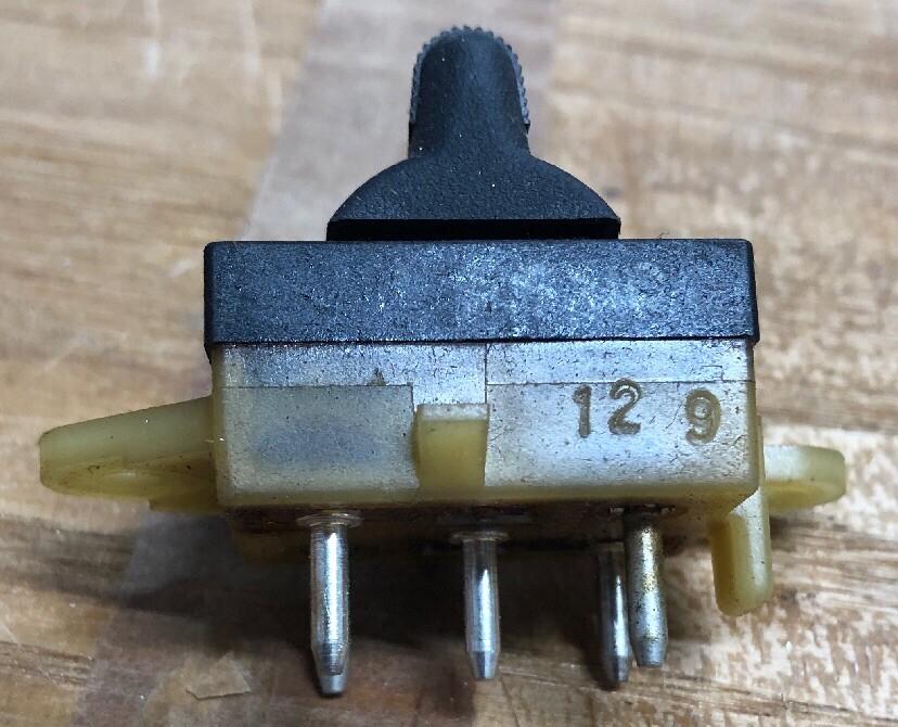 New Genuine Mopar Front Door-Lock Switch Part #4565330.
